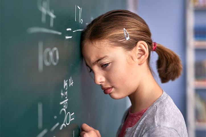 Girl Struggling with Math Problem