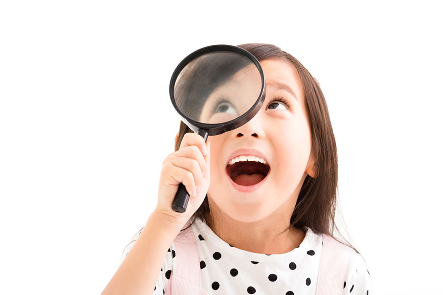 Girl with Magnifying Glass